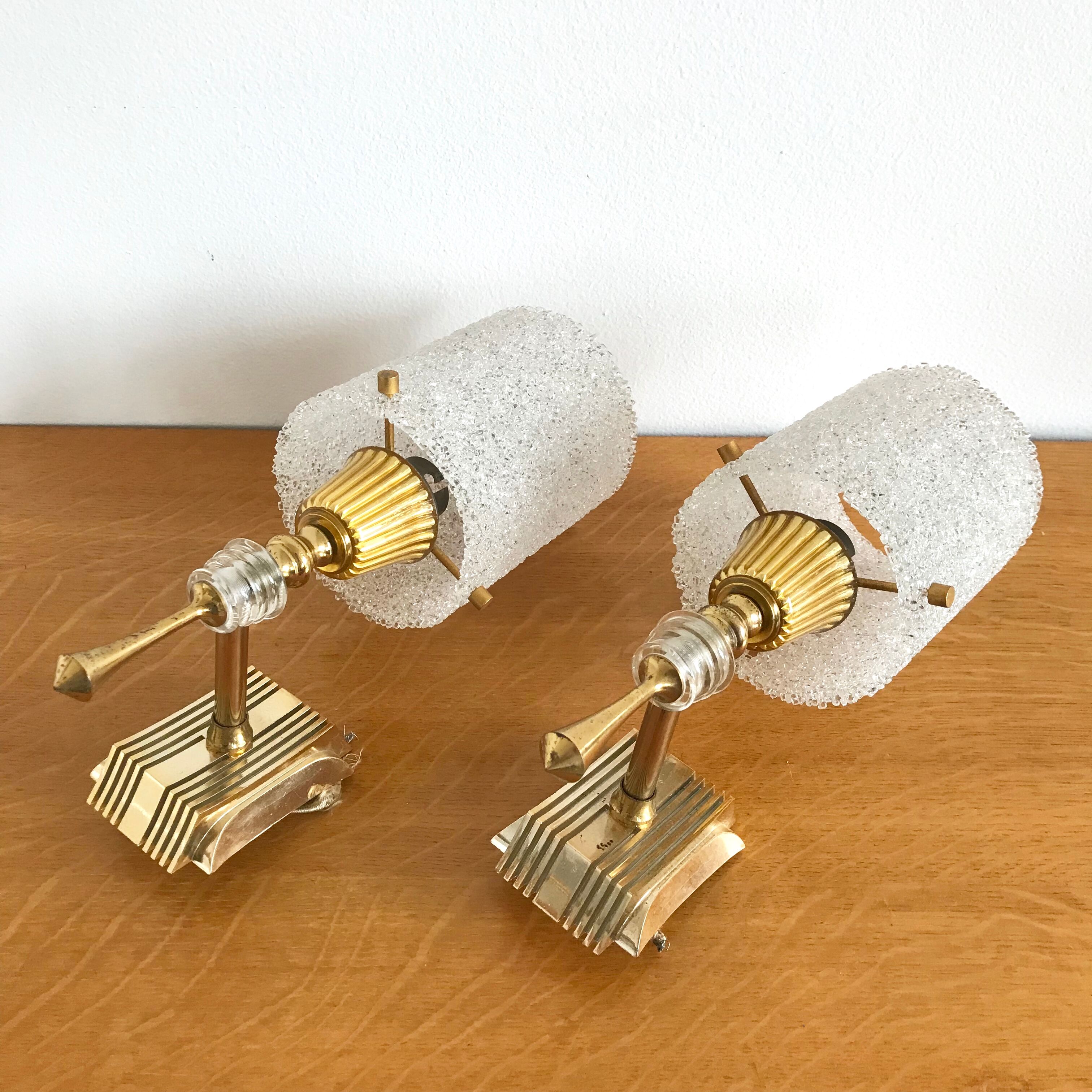 Pair of sconces in gold metal and plexi granita