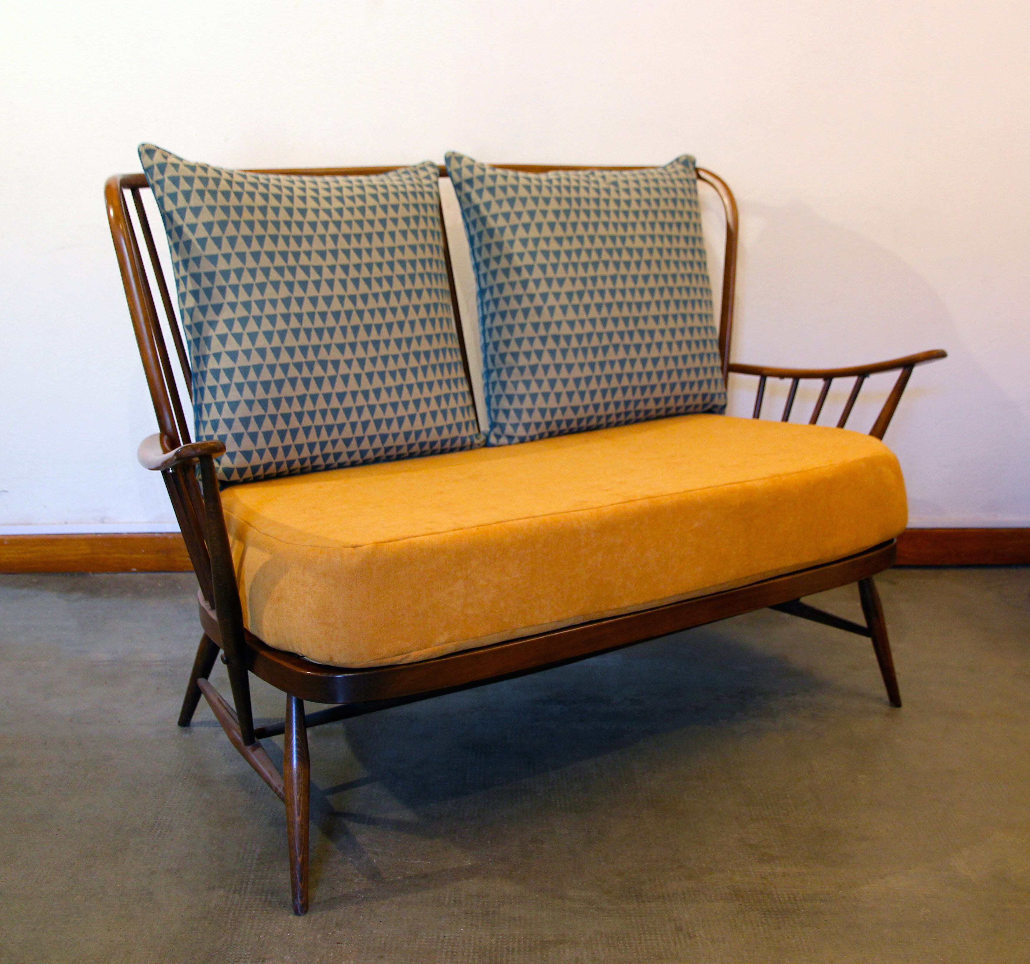 Ercol Springtime mustard yellow sofa