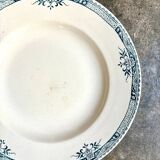Plat rond creux Longchamp en terre de fer, service "Lily"