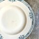 Longchamp hollow round dish in iron earth, "Lily" service