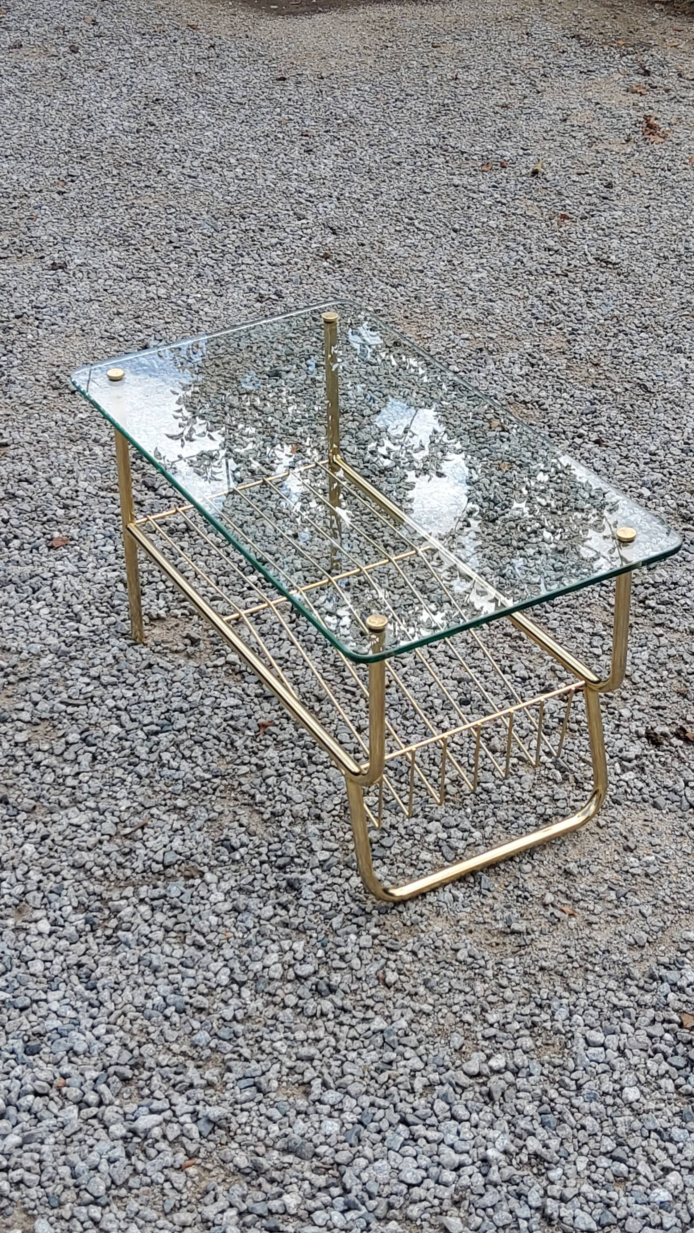Coffee table from the 60s top glass base metal gilded