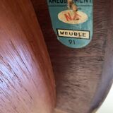 Round dining table with Scandinavian and Danish design in extendable teak from the 60s