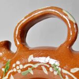 Circular glazed terracotta gargoulette