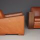 Paire de fauteuils Art Déco en cuir. Années 40.