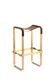 Bar stool in aged brass and brown leather.