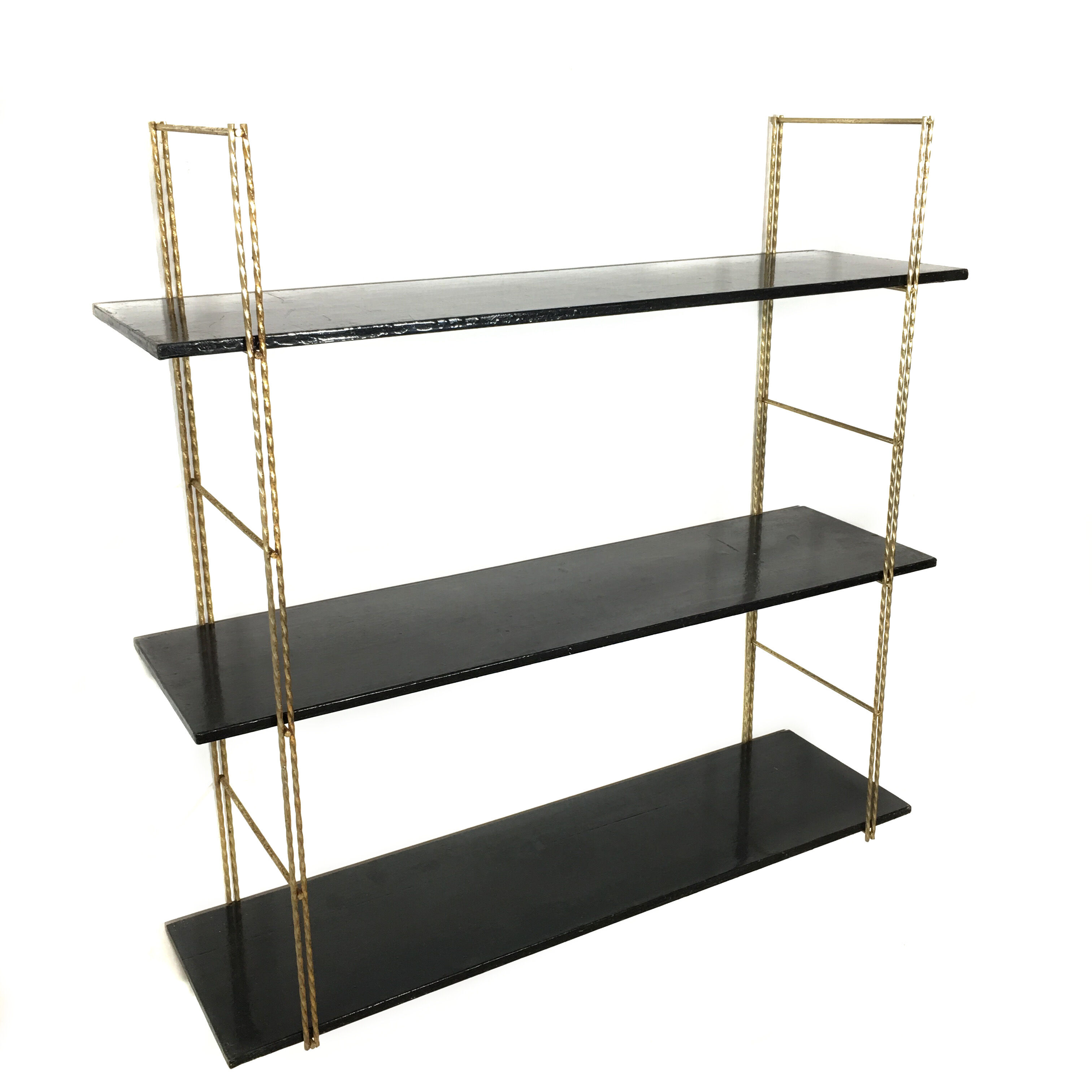 String gold metal shelf and black wood