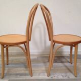 Pair of curved wooden bistro chairs