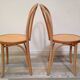 Pair of curved wooden bistro chairs