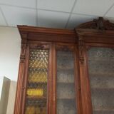 Glass-fronted walnut bookcase