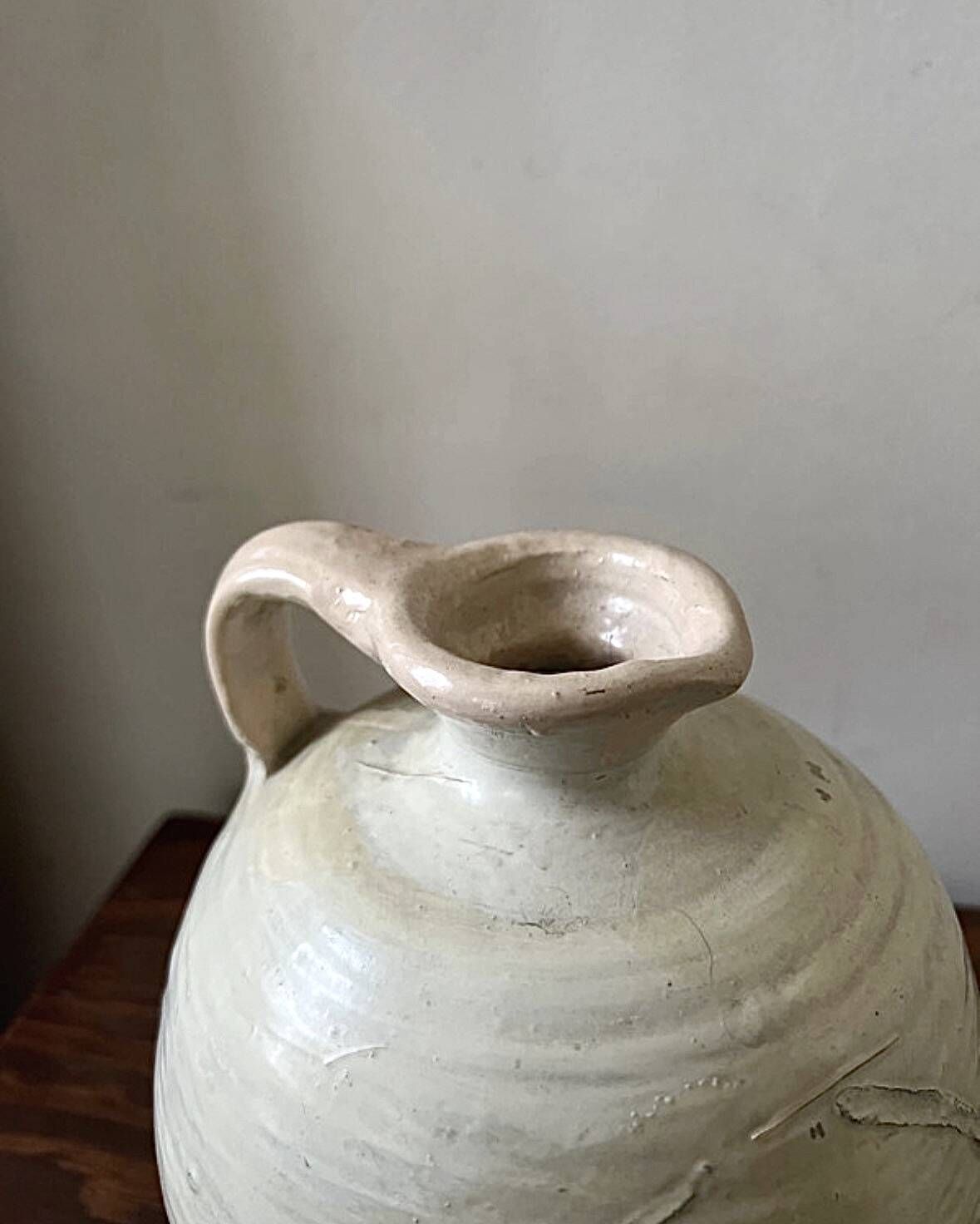 Wabi-sabi amphora vase in off-white and glazed, France circa 1970.
