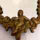 Gilded bronze mirror with angels and scrolls