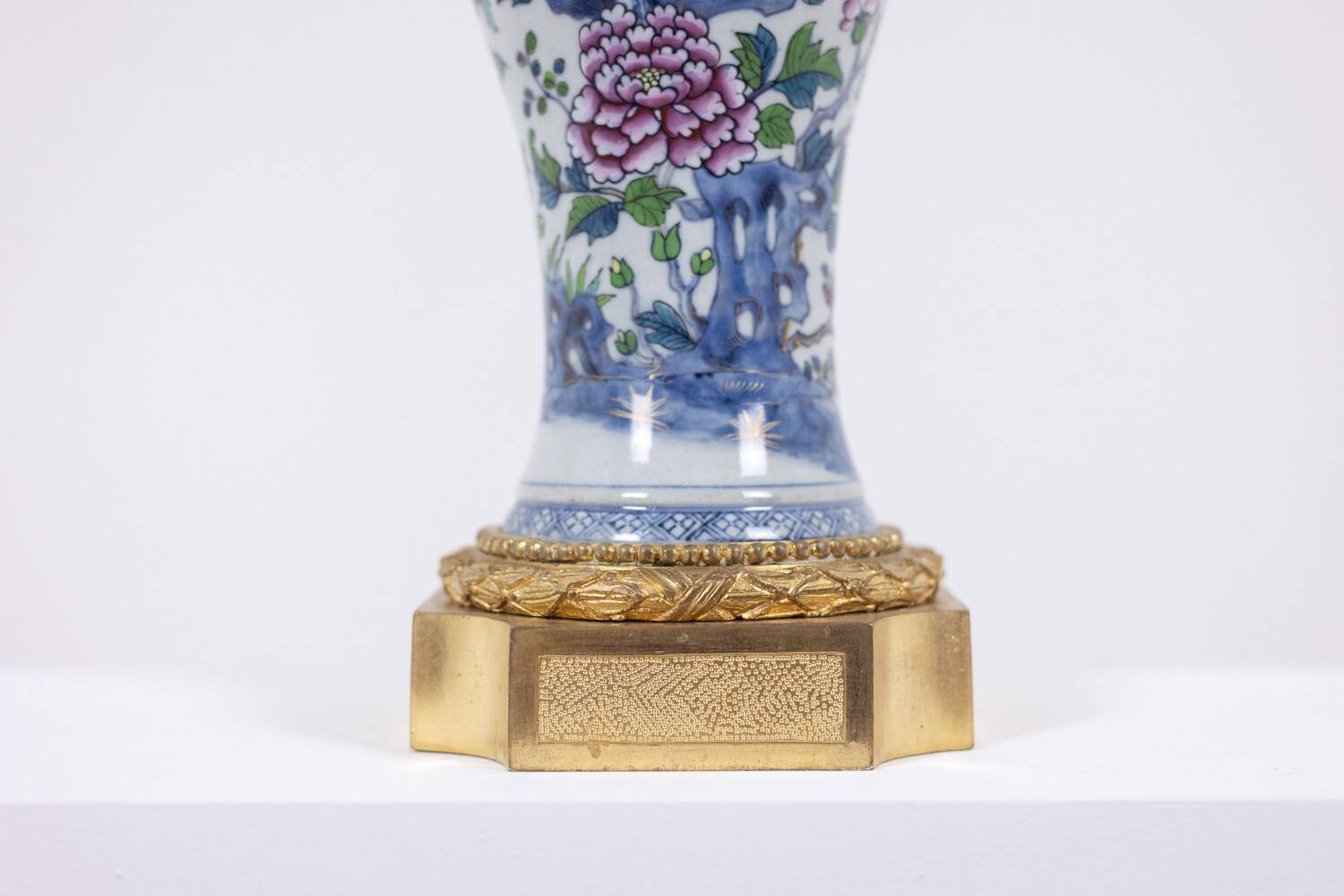 Pair of porcelain lamps decorated with bronze satyrs. Circa 1880.