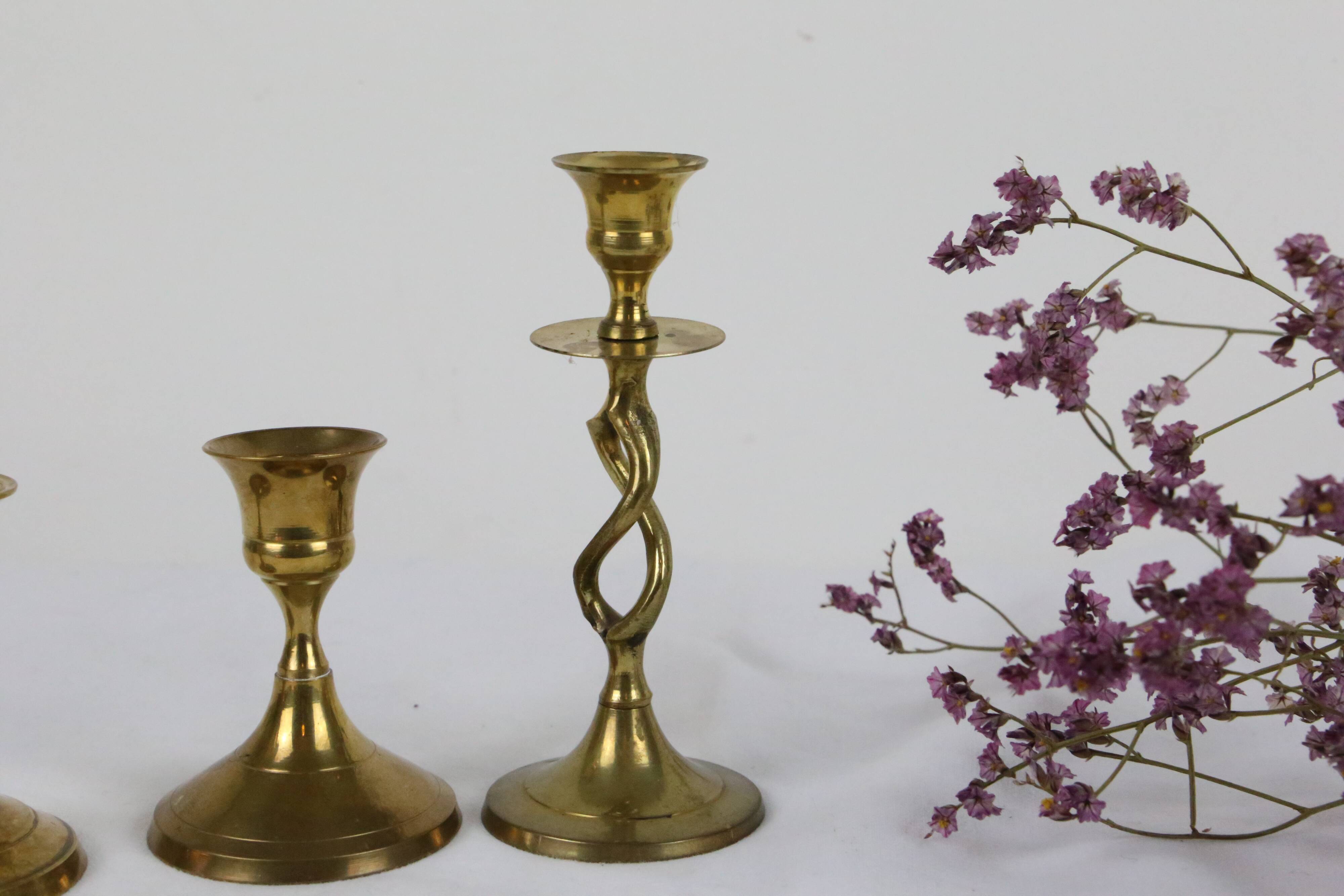 Trio of brass candle holders, vintage