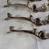 8 metal knife holders/dogs