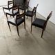 Set of 6 Scandinavian design chairs in solid teak and black Skai.