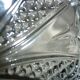 Oval compartmentalized plate in transparent glass