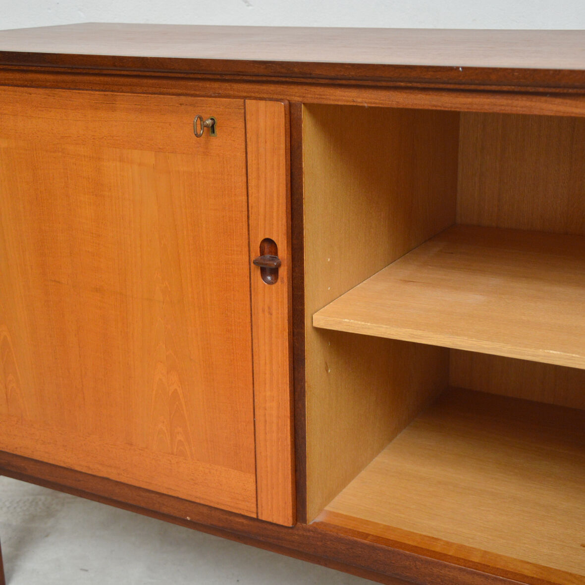 Row 3 doors clear teak, 1960