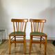 Pair of bistro chairs in light curved wood and green seat 1950s