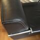 Fauteuil en cuir marron industriel