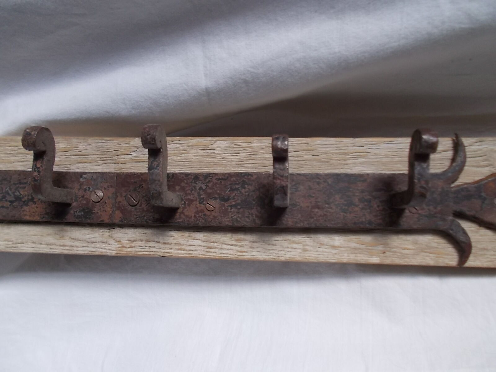 Wrought iron and wooden rack