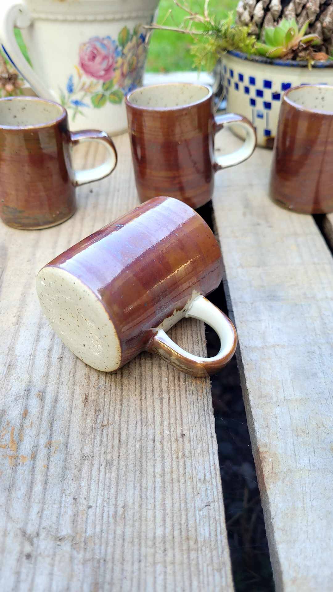 Vintage iridescent stoneware coffee mug.