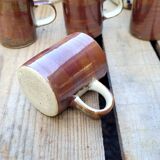 Vintage iridescent stoneware coffee mug.