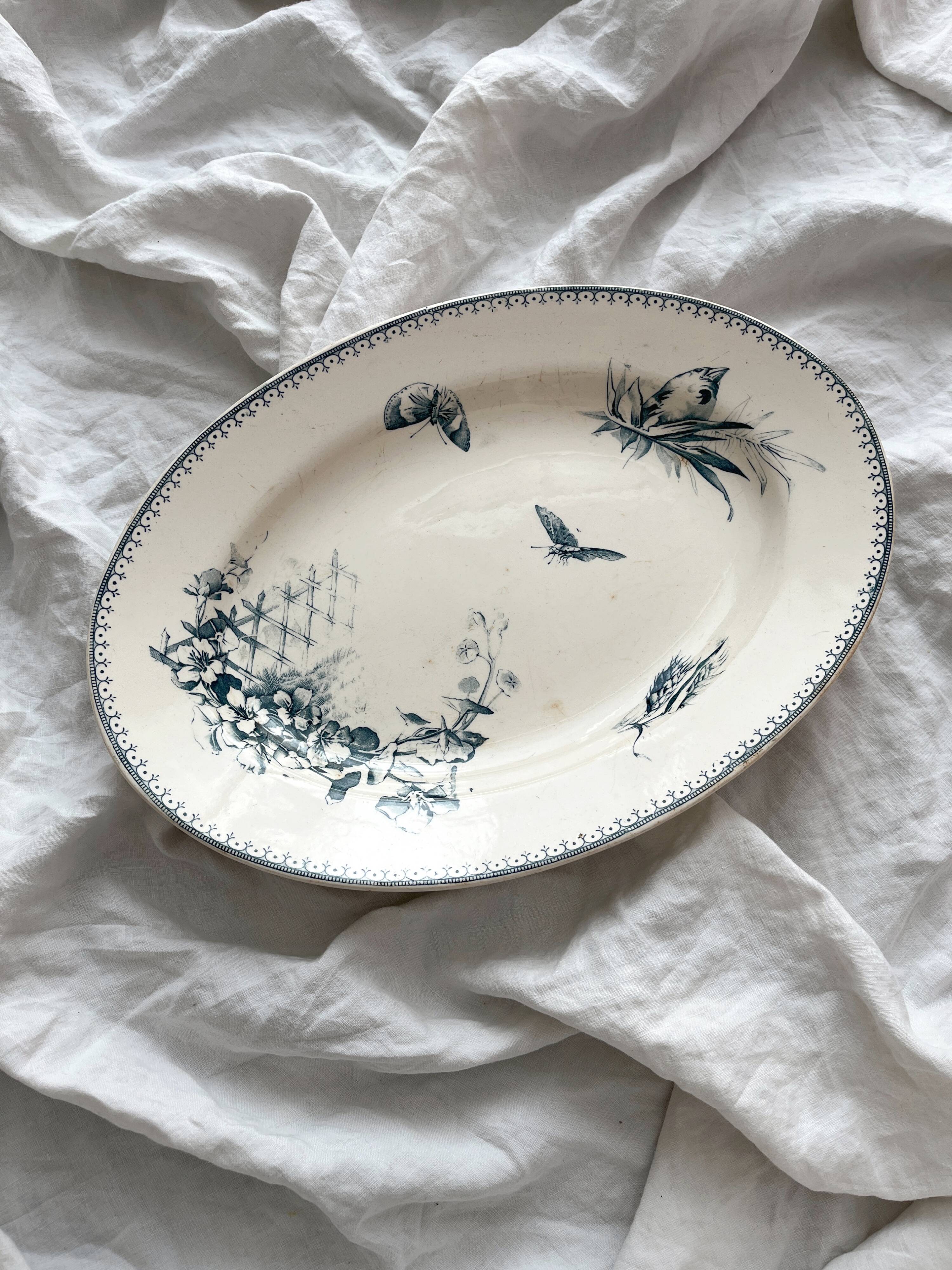 Oval ironstone dish with flowers and birds "Malaga" Petrus Regout