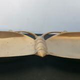 Empty brass butterfly pocket