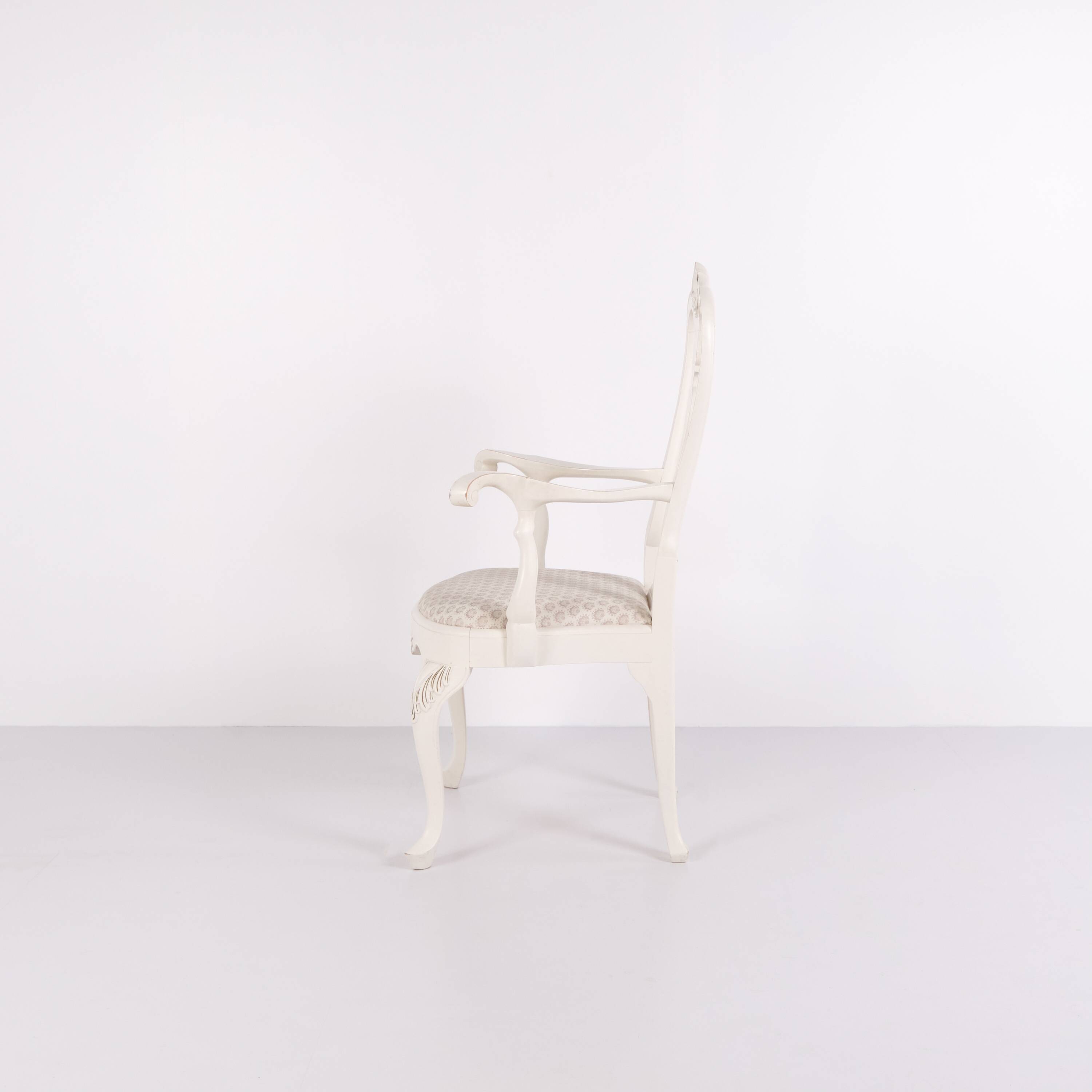A pair of armchairs – neo rococo style – white painted with decorative details – 1920s