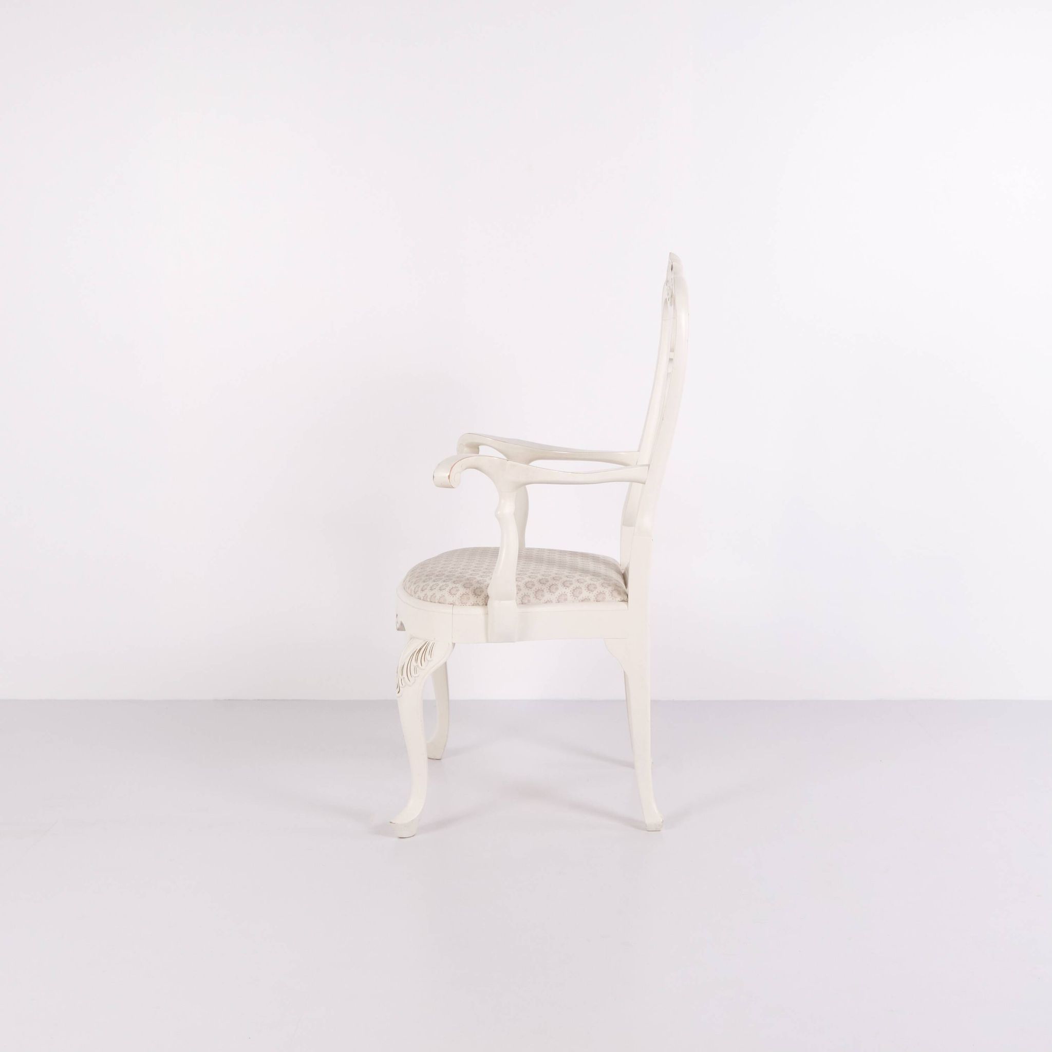 A pair of armchairs – neo rococo style – white painted with decorative details – 1920s