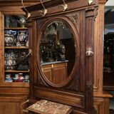 Solid walnut vestibule coat rack with oval mirror and bronze hooks