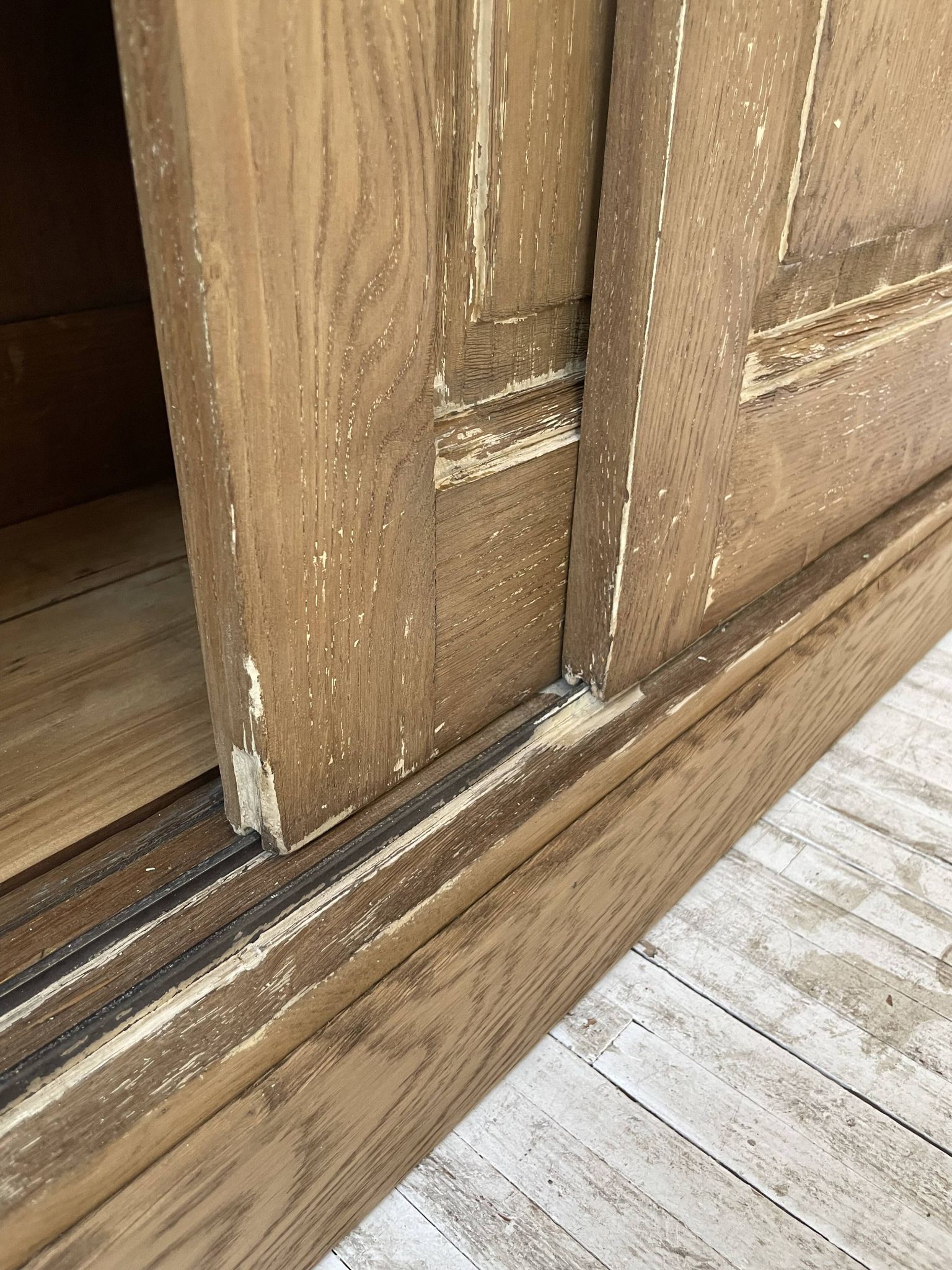 Large row of solid oak loom sliding doors