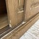 Large row of solid oak loom sliding doors