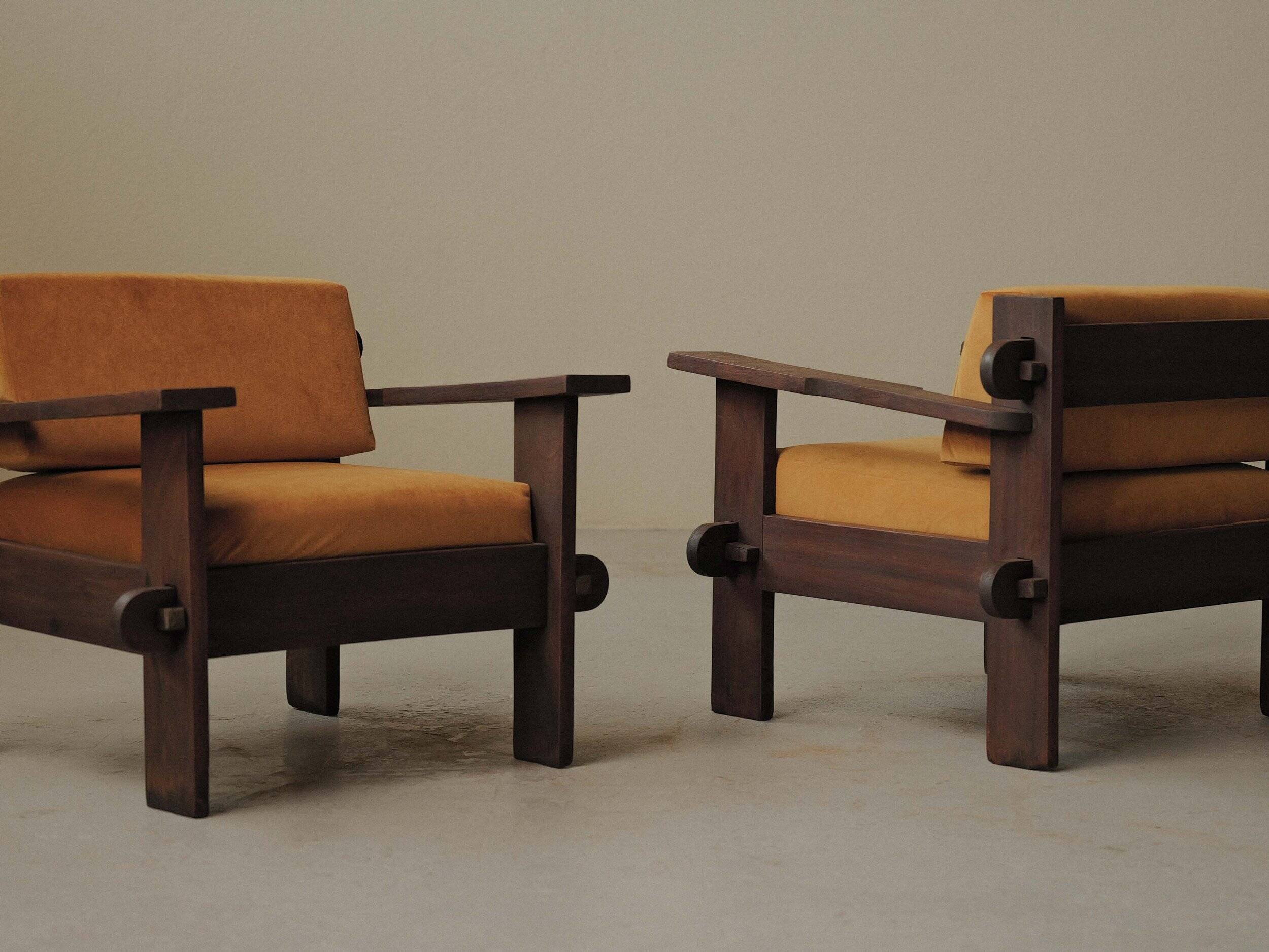 Pair of architect's armchairs in solid wood, France, circa 1970.