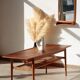 Vintage Scandinavian coffee table in teak and rattan – Danish design from the 1960s.