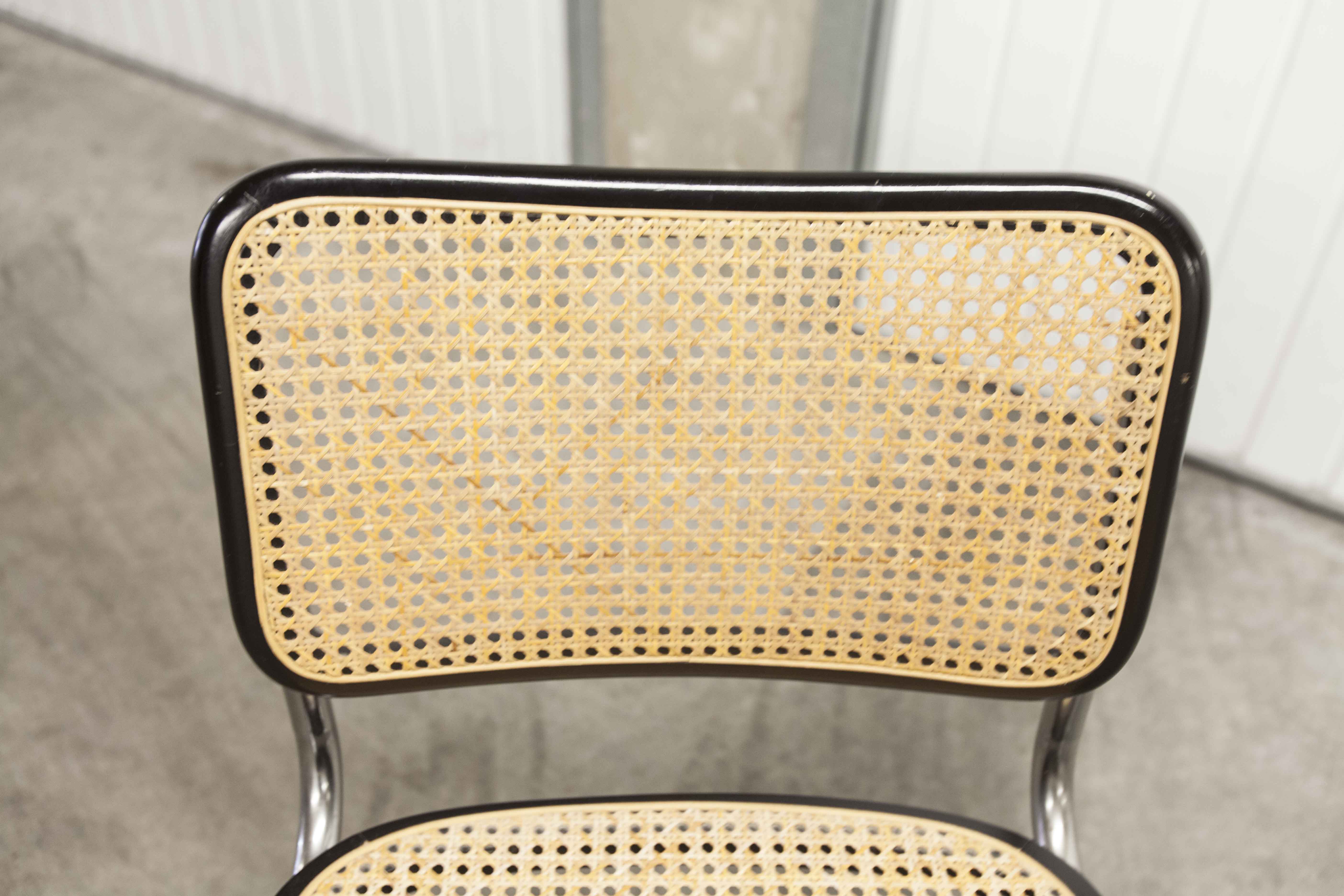 Pair of black Breuer b32 chairs and cannage