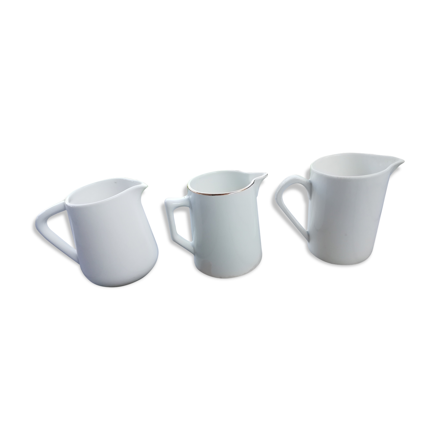 Lot of white porcelain pitchers