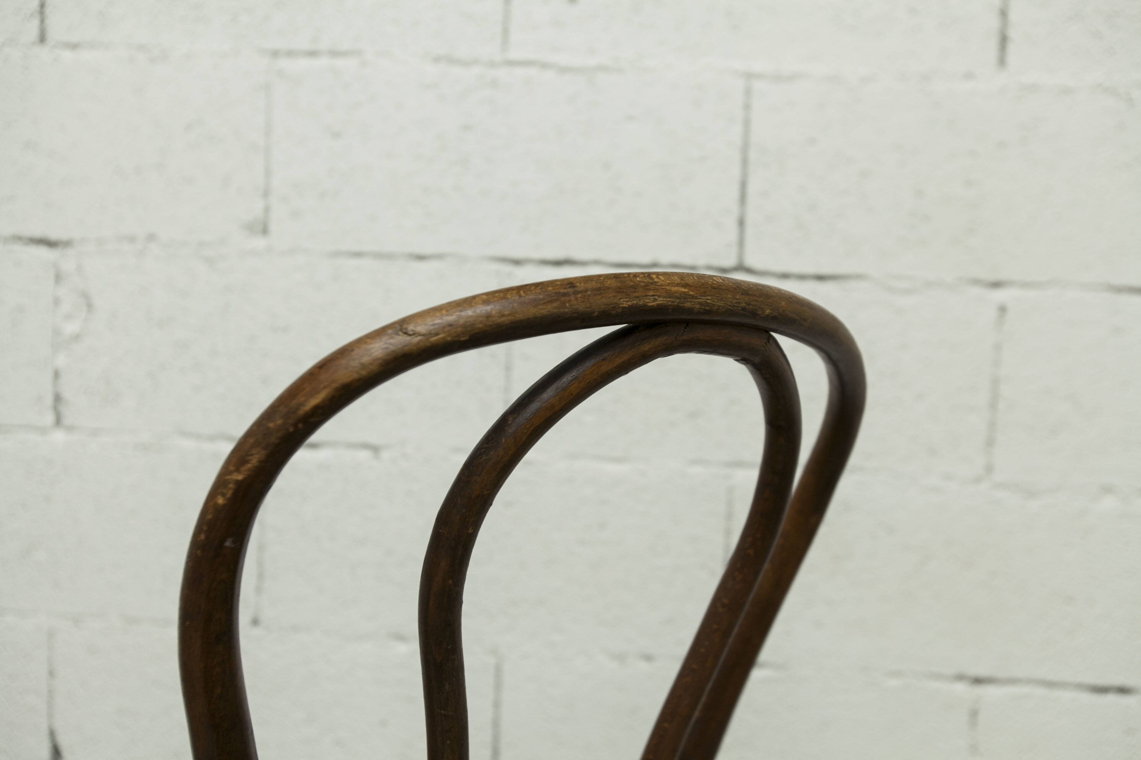 1920s curved wooden cane bistro chair