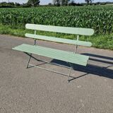Old wrought iron folding bench