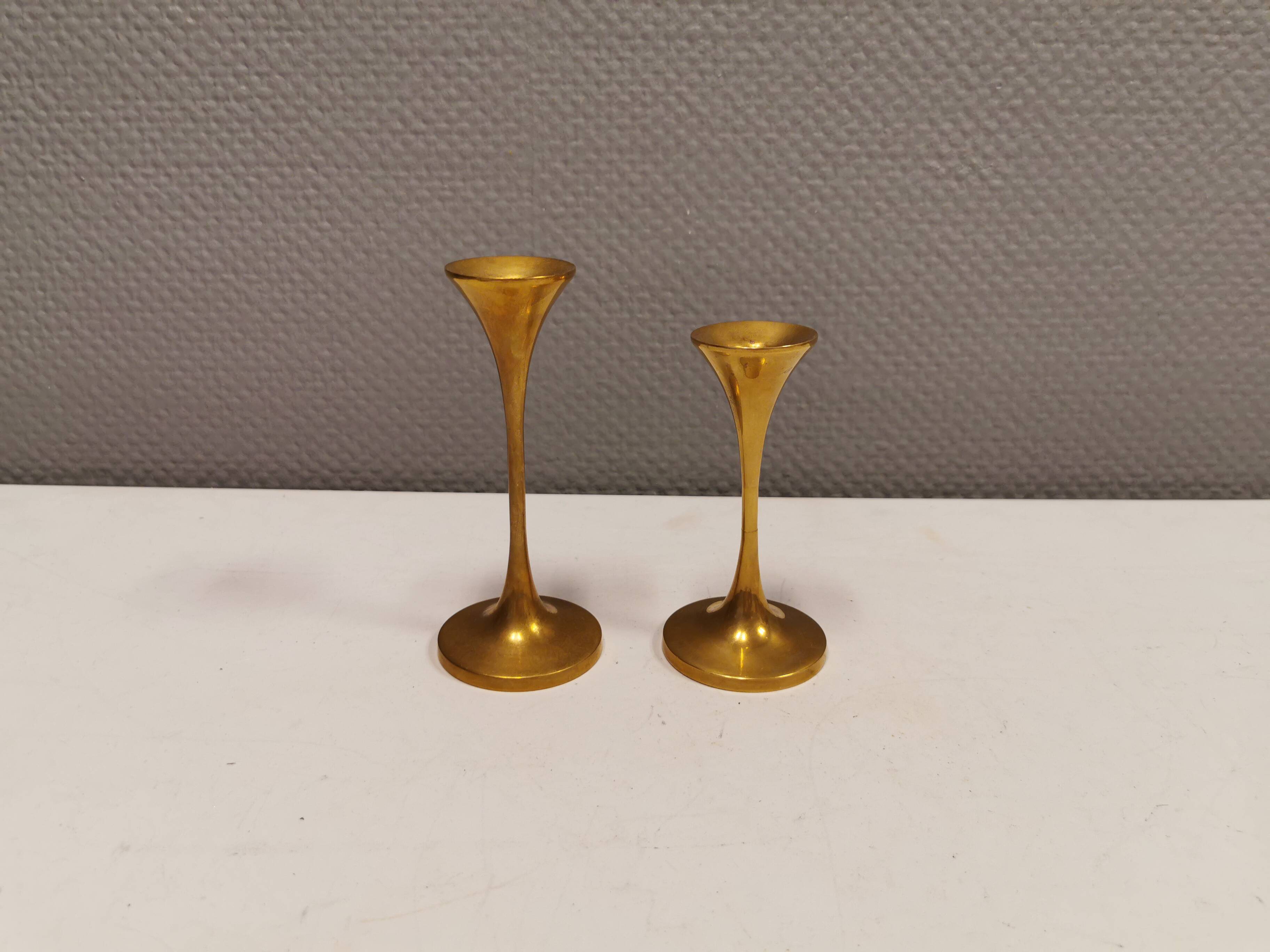 A set of candle sticks, in solid brass, made by Malm Denmark in the 1960s
