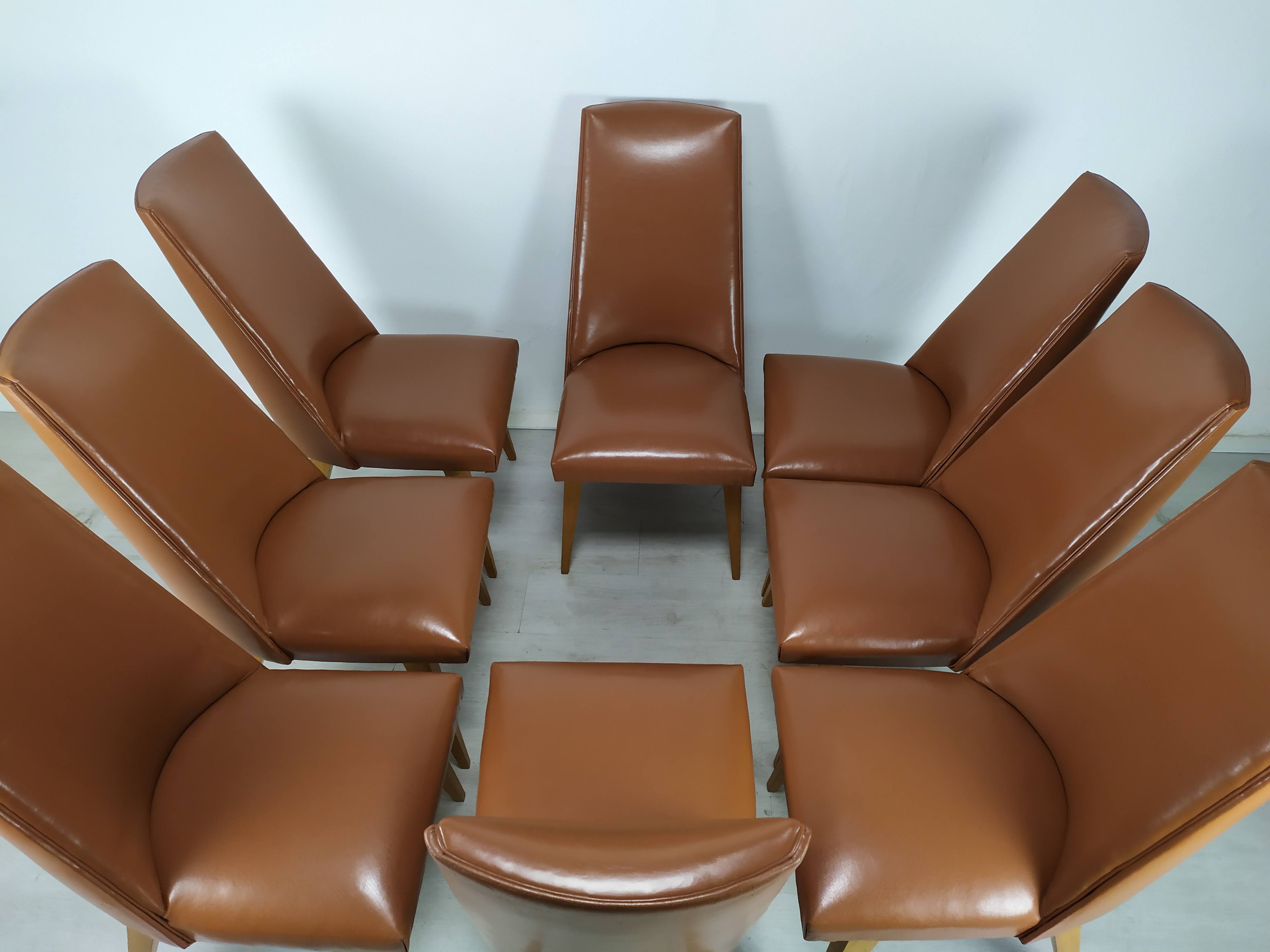 8 brown skai chairs 1950