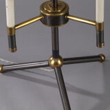 Modernist table lamp in black and gold lacquered metal