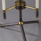 Lampe de table moderniste en métal laqué noir et doré