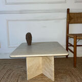 Square coffee table in travertine.