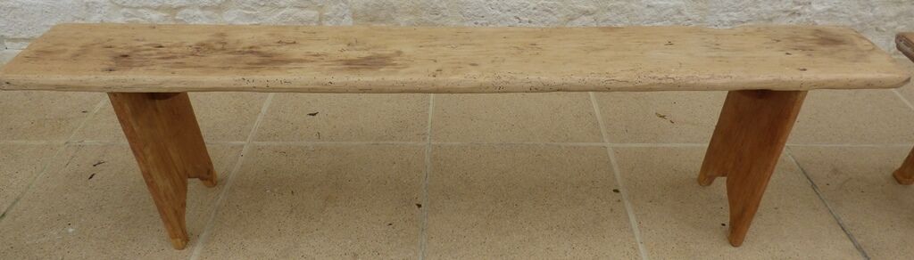 Two benches in their solid wood patinas