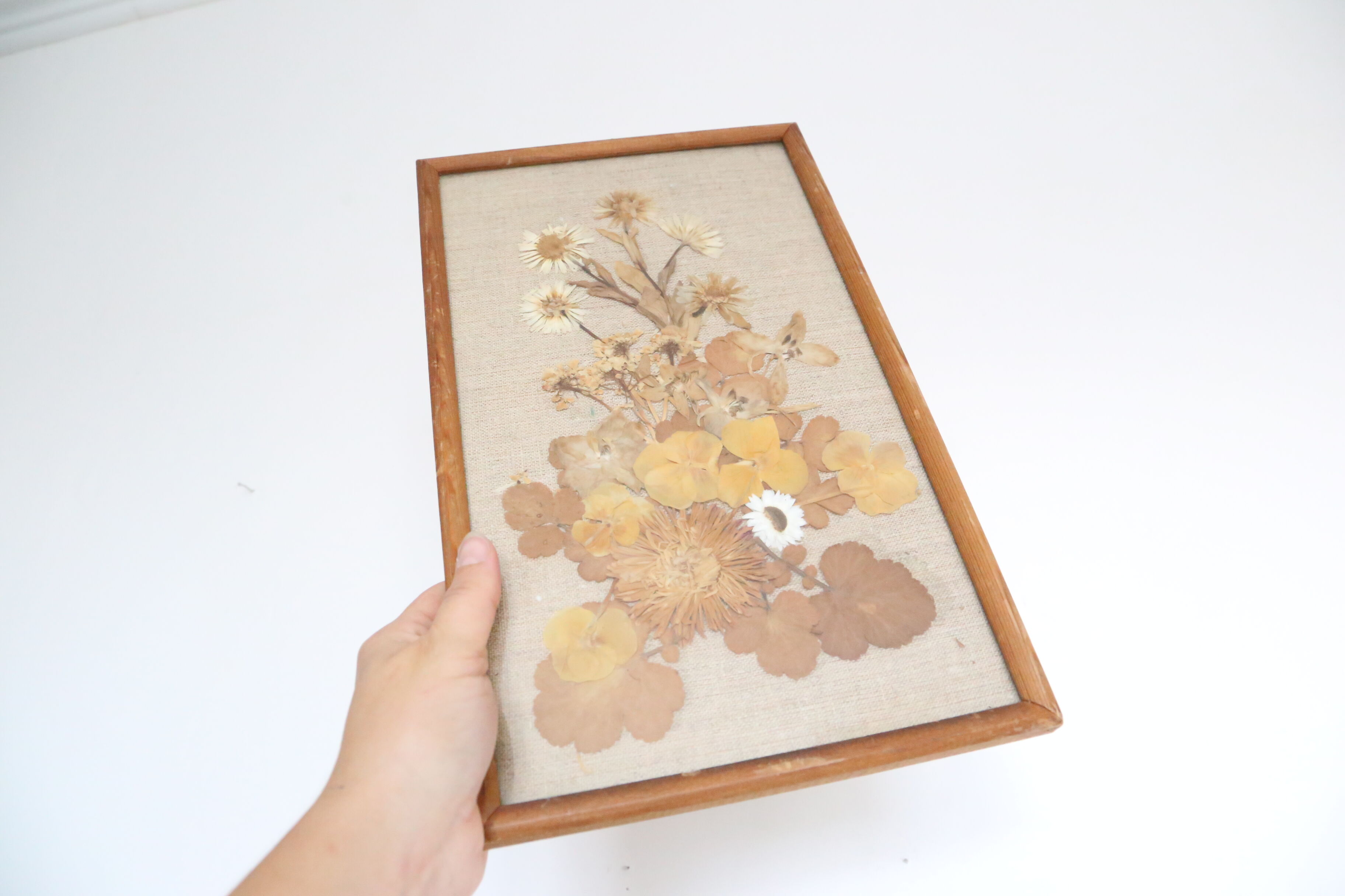 Nice table of dried flowers on beige linen
