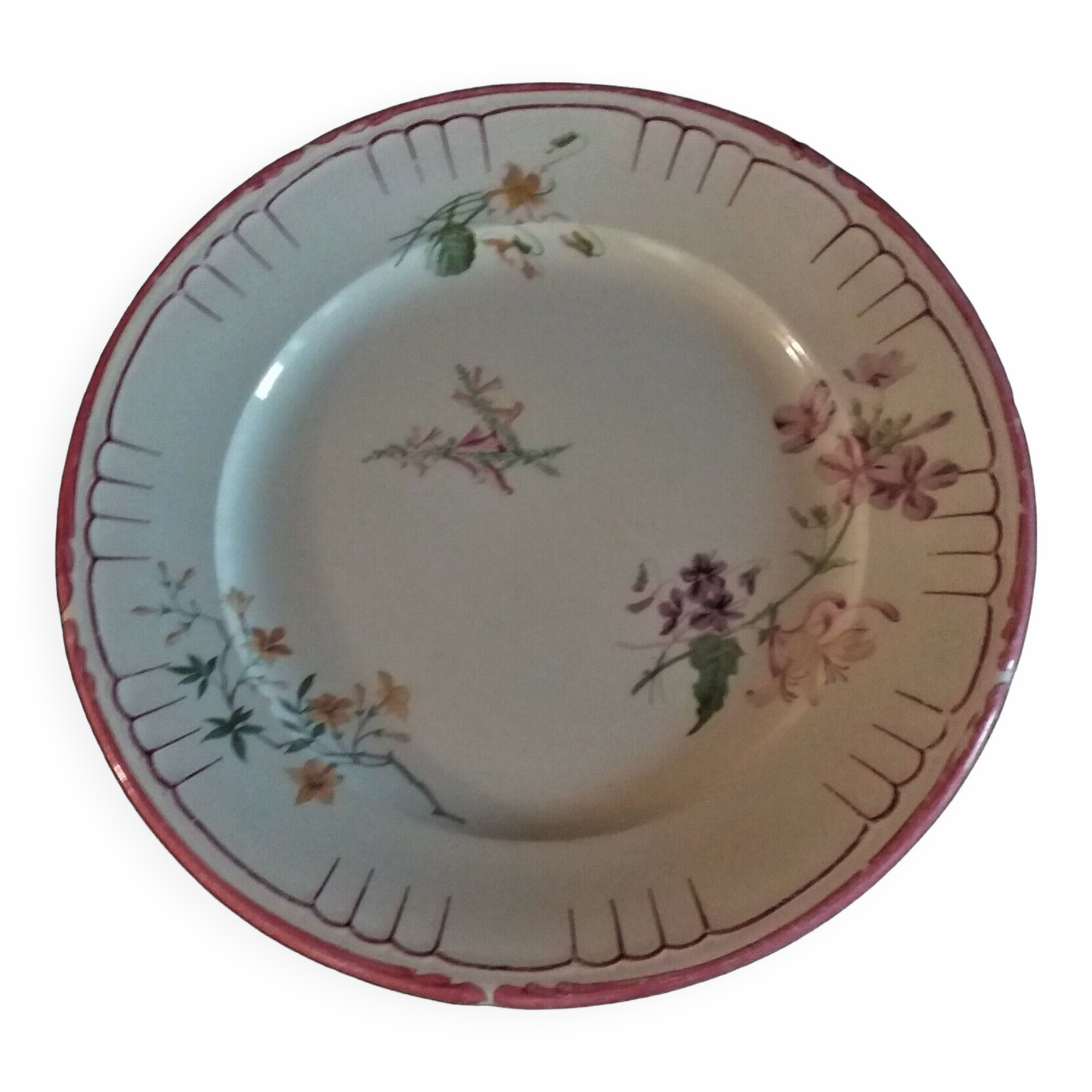 Flat earthenware plate by Choisy le Roi for Au vase étrusque Paris