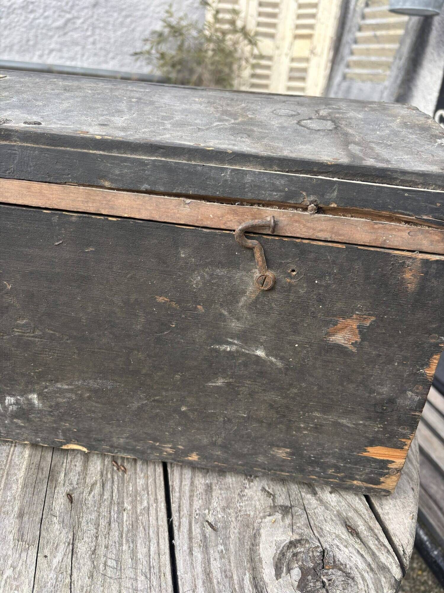 Black travel trunk
