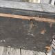 Black travel trunk