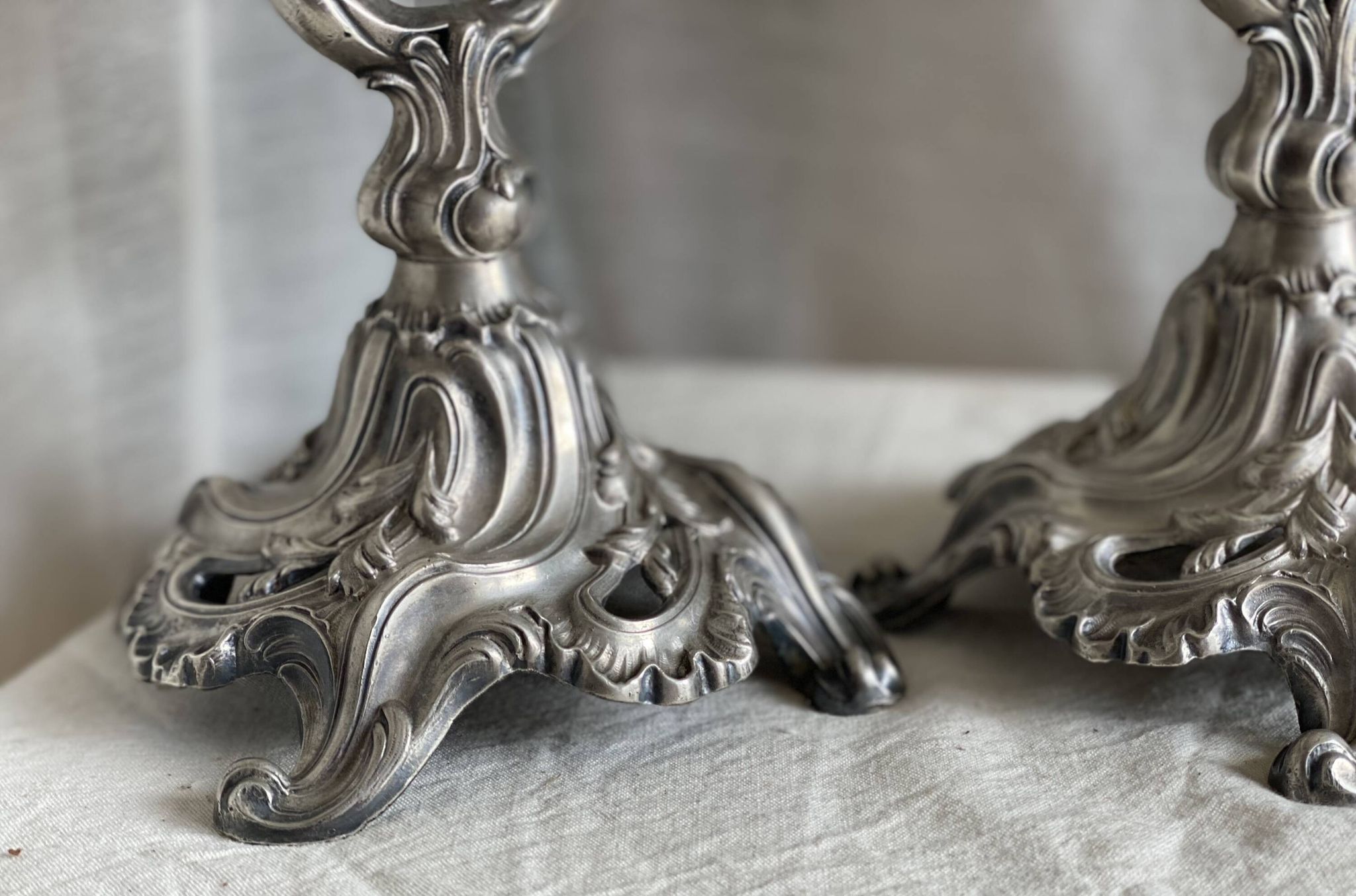 Pair of vintage 1950s silver-plated metal rocaille chandeliers